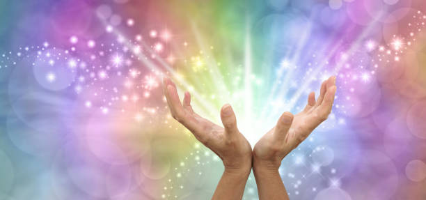 istock Sending out beautiful powerful white light healing energy 1047813644