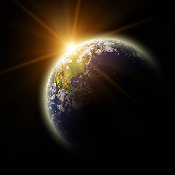 istock Real Earth Planet in yellow sun 104781418