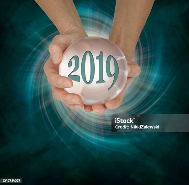 Take A Look At What 2019 Holds With A Crystal Ball Reading Stock Photo - Download Image Now