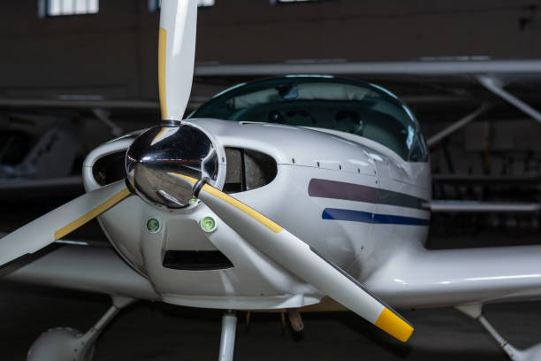 Small airplane in a hangar stock photo