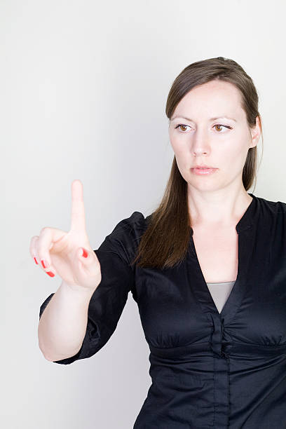 istock Businesswoman pointing at 104781933