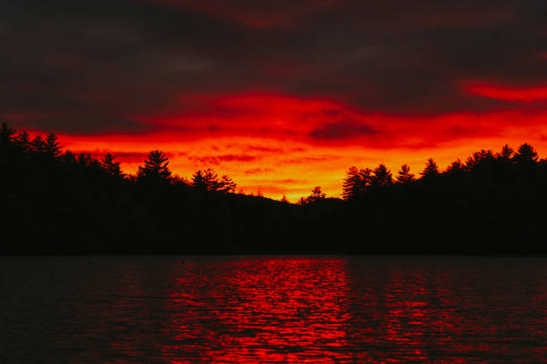 istock New Hampshire Sunset over a Pond 1047827000