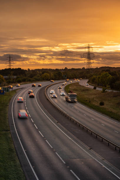 istock Headlights and Taillights on Motorway at Night in UK 1047835406