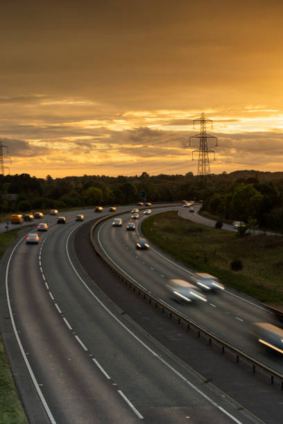 istock Headlights and Taillights on Motorway at Night in UK 1047835648
