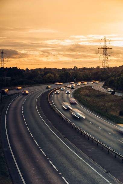 istock Headlights and Taillights on Motorway at Night in UK 1047836208