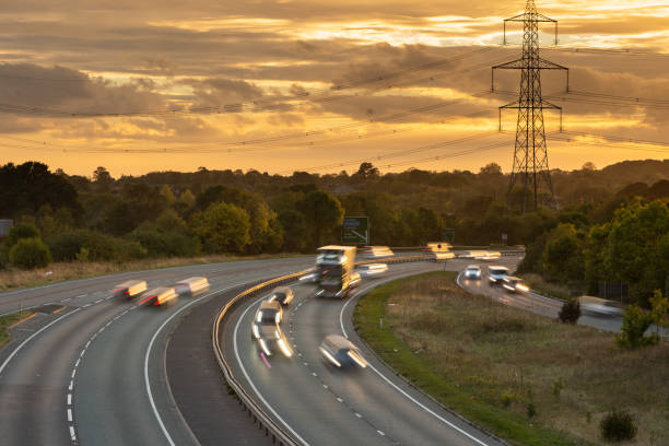 istock Headlights and Taillights on Motorway at Night in UK 1047836332