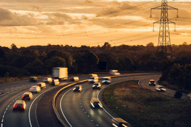 istock Headlights and Taillights on Motorway at Night in UK 1047836488