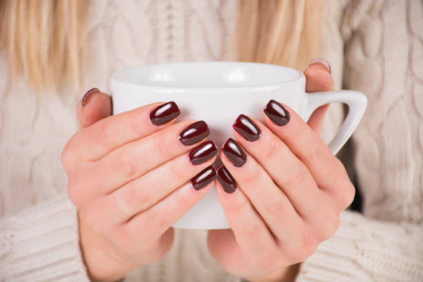Woman With Brown Nails Polish Holds Cup Of Coffee In Hands Stock Photo - Download Image Now - iStock Woman With Brown Nails Polish Holds Cup Of Coffee In Hands Stock Photo - Download Image Now - iStock
