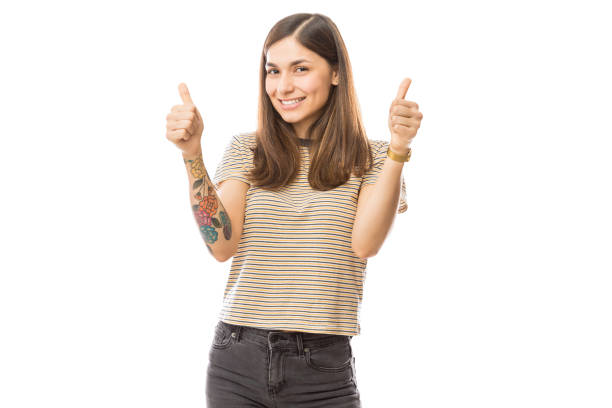 istock Female Showing Thumbs Up With Both Hands 1047849234
