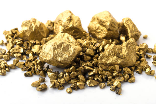 istock mound of gold close-up isolated on white background 1047852886