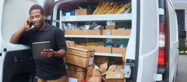 istock Tradesman on the phone checking parts details 1047863596