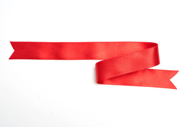 istock red ribbon banner on white background 1047876308