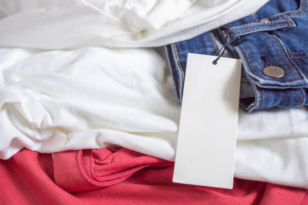 istock Blank price tag label on white t-shirt 1047876510