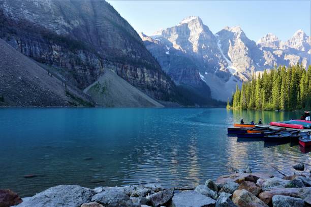 istock Canoes at Moraine Lake, Banff, Alberta, Canada 1047881092