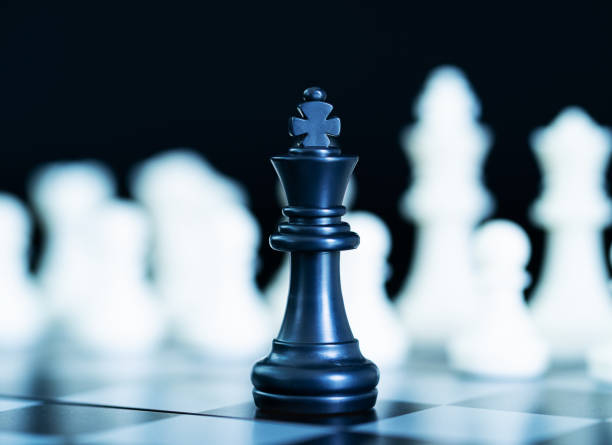 istock Close up chess pieces on chessboard 1047883920