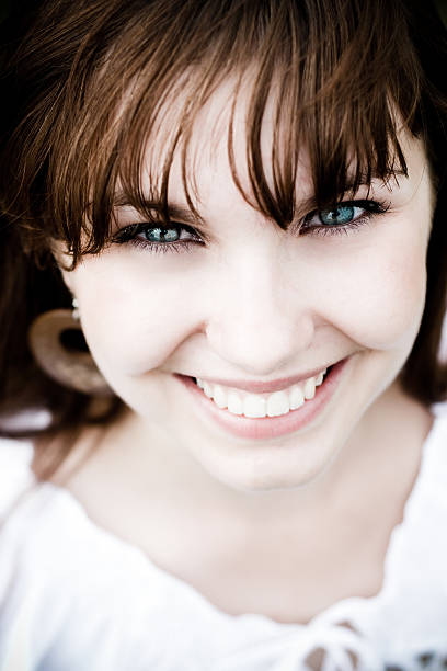 Attractive young girl smiling stock photo