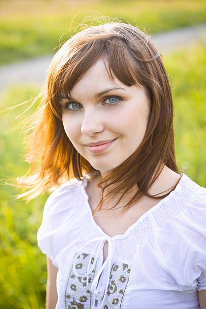 Attractive young girl smiling stock photo