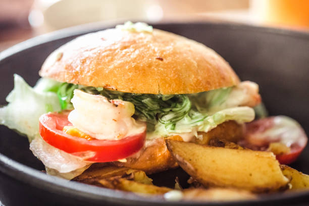 istock sandwich with potatoes on a plate in a cafe 1047893950