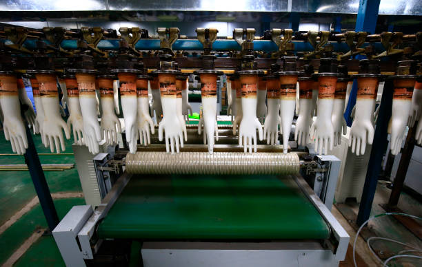 istock Gloves factory production workshop and mechanical equipment 1047893982