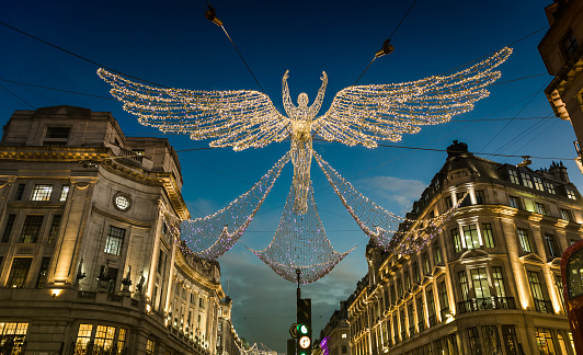 Christmas Angels Holiday  lights on Regent Street. Festive Lights Display on popular, shopping London street.
