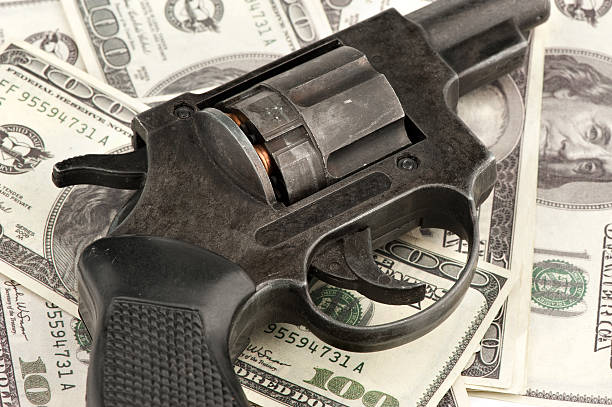 istock gun and money 104790907