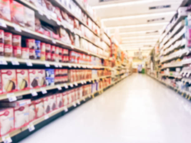 istock Blurry background low angle view cake and baking supplies aisle at grocery store 1047912828