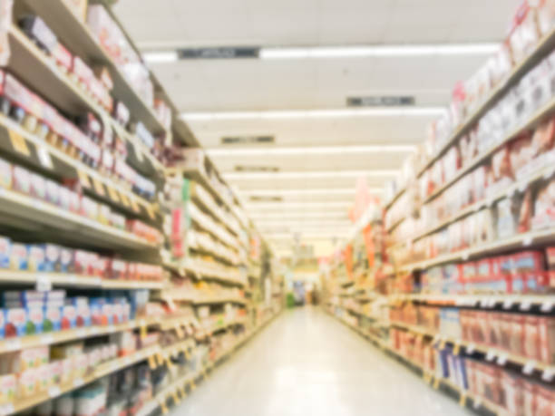 istock Blurry background low angle view cake and baking supplies aisle at grocery store 1047913012
