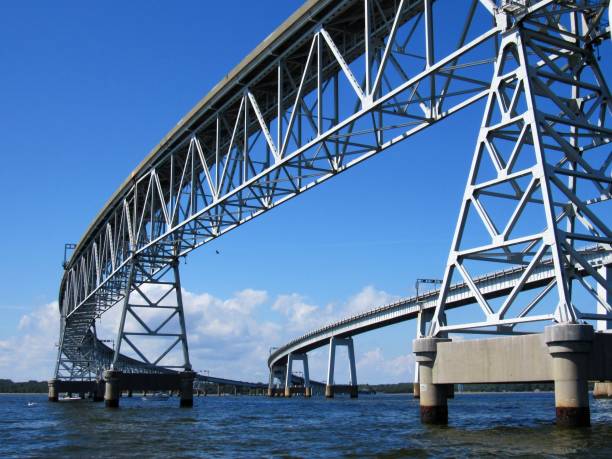 Chesapeake Bay Bridge Chesapeake Bay Bridge on a sunny summer day seen from a boat on the Chesapeake Bay near Annapolis, Maryland USA channel marker stock pictures, royalty-free photos & images