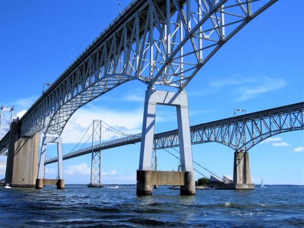 Chesapeake Bay Bridge Chesapeake Bay Bridge on a sunny summer day seen from a boat on the Chesapeake Bay near Annapolis, Maryland USA channel marker stock pictures, royalty-free photos & images