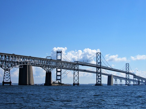 Chesapeake Bay Bridge on a sunny summer day seen from a boat on the Chesapeake Bay near Annapolis, Maryland USA