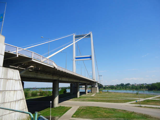 istock white bridge over the lake, full of water, tree 1047934686