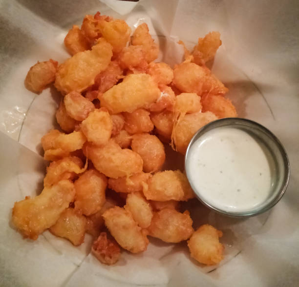 Delicious traditional cheese curds snacks from Wisconsin, United States Delicious traditional cheese curds snacks from Wisconsin, United States curd cheese photos stock pictures, royalty-free photos & images