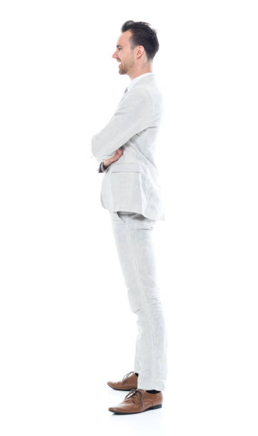 istock Handsome businessman with arms folded 1047951008