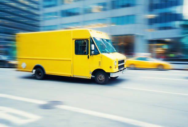 istock Yellow delivery truck 1047951060