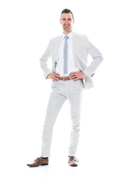 istock Handsome businessman with hands on hips 1047951072