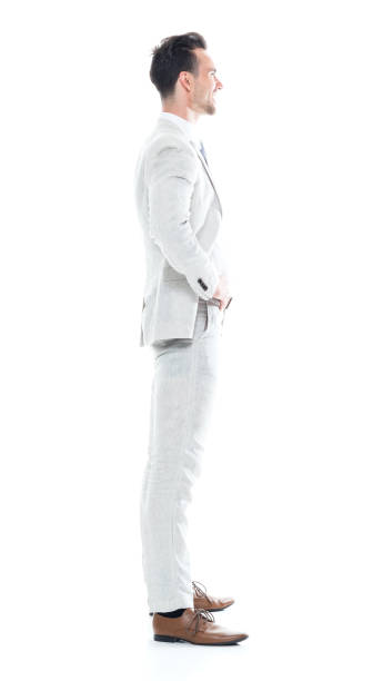 istock Handsome businessman with hands on hips 1047951184
