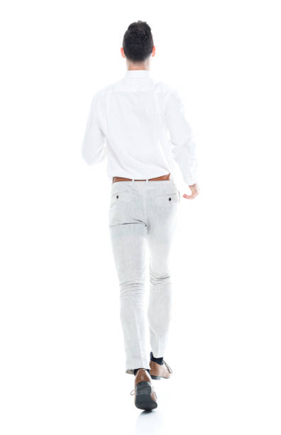 istock Handsome businessman running, rear view 1047951334