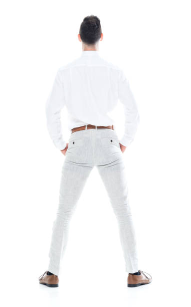 istock Handsome businessman with hands in pocket 1047951428
