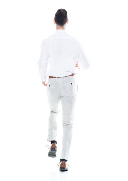 istock Handsome businessman running, rear view 1047952024