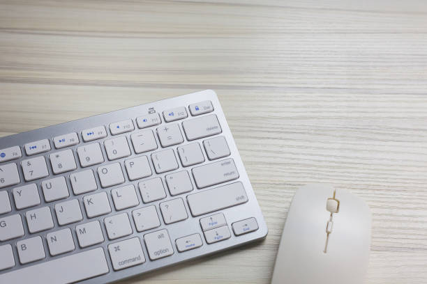 istock The work station office flat lay wood table image for background. 1047970240