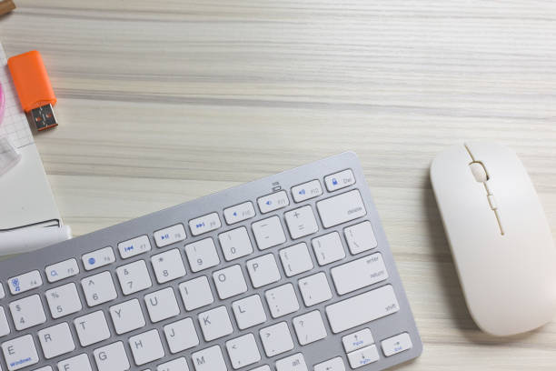istock The work station office flat lay wood table image for background. 1047970380