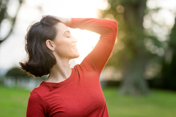 istock Woman touching her hair 1047977534