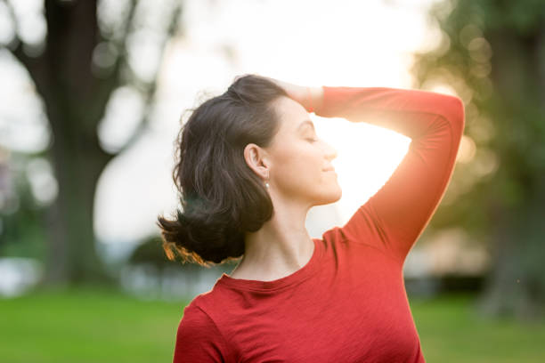 istock Woman touching her hair 1047977944