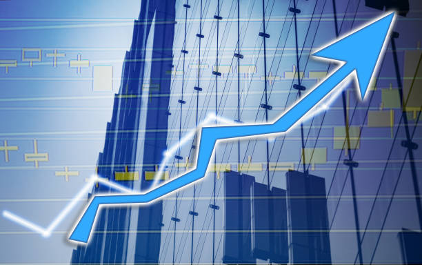 istock Composing with business building and stock chart on background (blue bull chart) 1047979846