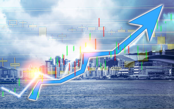 istock Composing with business building and stock chart on background (blue bull chart) 1047979854
