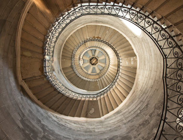 istock Circular stairway in Lyon Church 1047995006
