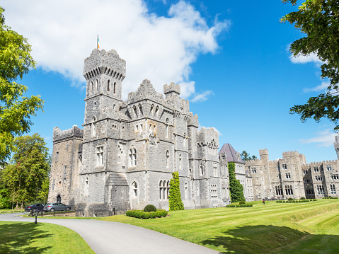 Cong, Ireland - August 10, 2018: Ashford Castle is a medieval and Victorian castle that has been turned into a luxury hotel near Cong on the Mayo-Galway border in Ireland.