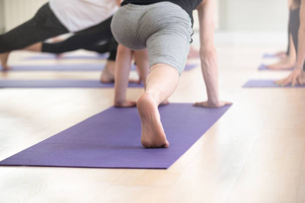 istock Sporty man practicing fitness, doing exercise, close up 1048005110