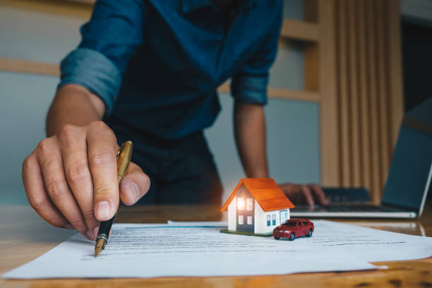 istock Agent give agreement contract document to customer. Property and Real Estate concept. 1048035416
