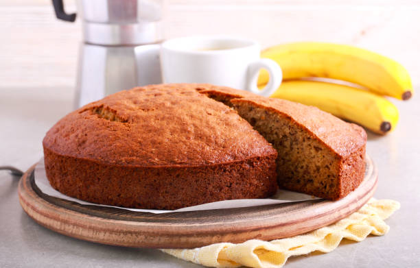 istock Banana cake, with a slice 1048041082